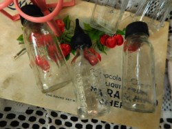GROUPINGS OF 2 VINTAGE  EVENFLO GLASS  BOTTLES COMPLETE, OR FUNNEL CUP ACCESSORIES